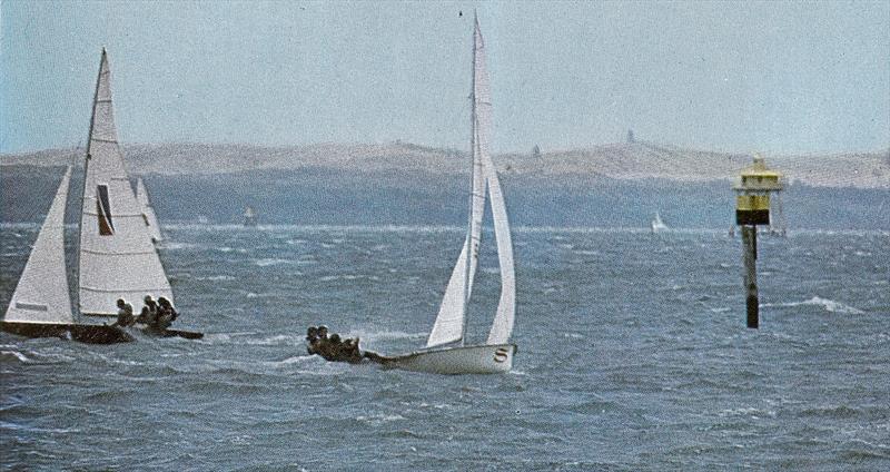 Smirnoff (Don and Jim Lidgard and Ian Harrison) cross John Lasher's UFO, at 1974 18ft Skiff worlds in Auckland photo copyright Jenny Farrell taken at Auckland Sailing Club and featuring the 18ft Skiff class