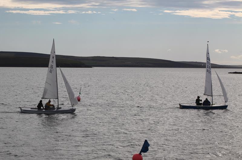 The finish of the Allcomers race with Peter Tipler's Go Faster Blue ahead of Mairi Fleet's Smurf during the Holm Regatta photo copyright Fredrik Sundman taken at Holm Sailing Club and featuring the Snipe class