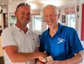 Hugh Ambrey from Cransley SC receives the 3rd Solo trophy from Vice Commodore Roo Jarvis - Solo and Laser Open Meeting at Middle Nene © David Livingstone