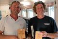 Mark Greer receives the 1st Solo trophy and the One Up Cup trophy from Vice Commodore Roo Jarvis - Solo and Laser Open Meeting at Middle Nene © David Livingstone