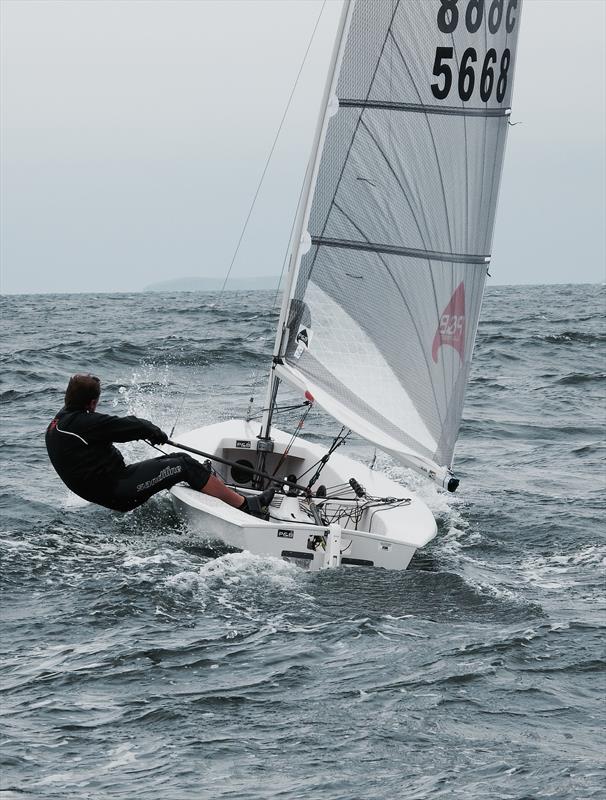 Ollie Wells on day 6 of the Superspars National Solo UK Championship photo copyright Will Loy taken at Plas Heli Welsh National Sailing Academy and featuring the Solo class