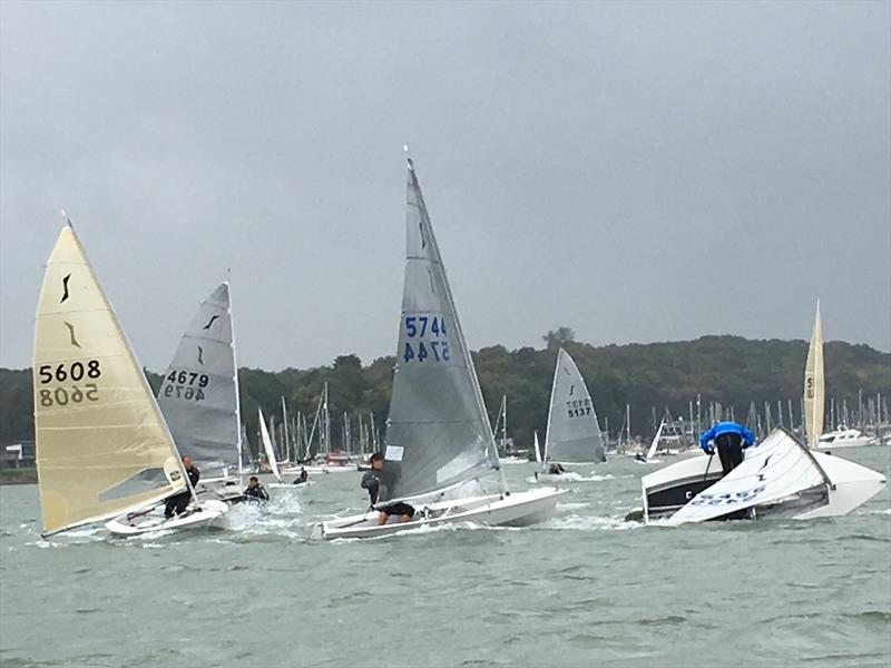 Solos at Woolverstone photo copyright Simon Hewitt & Will Patten taken at Royal Harwich Yacht Club and featuring the Solo class