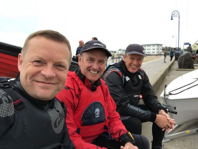 Not much breeze but happy sailors thinking of cake during the Felpham Solo Open photo copyright Mark Harper taken at Felpham Sailing Club and featuring the Solo class