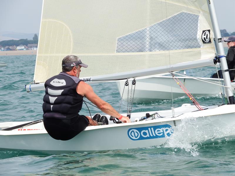 Andy Bayliss soaks up the sun on day 3 at the Magic Marine National Solo Championship at Hayling Island photo copyright Will Loy taken at Hayling Island Sailing Club and featuring the Solo class