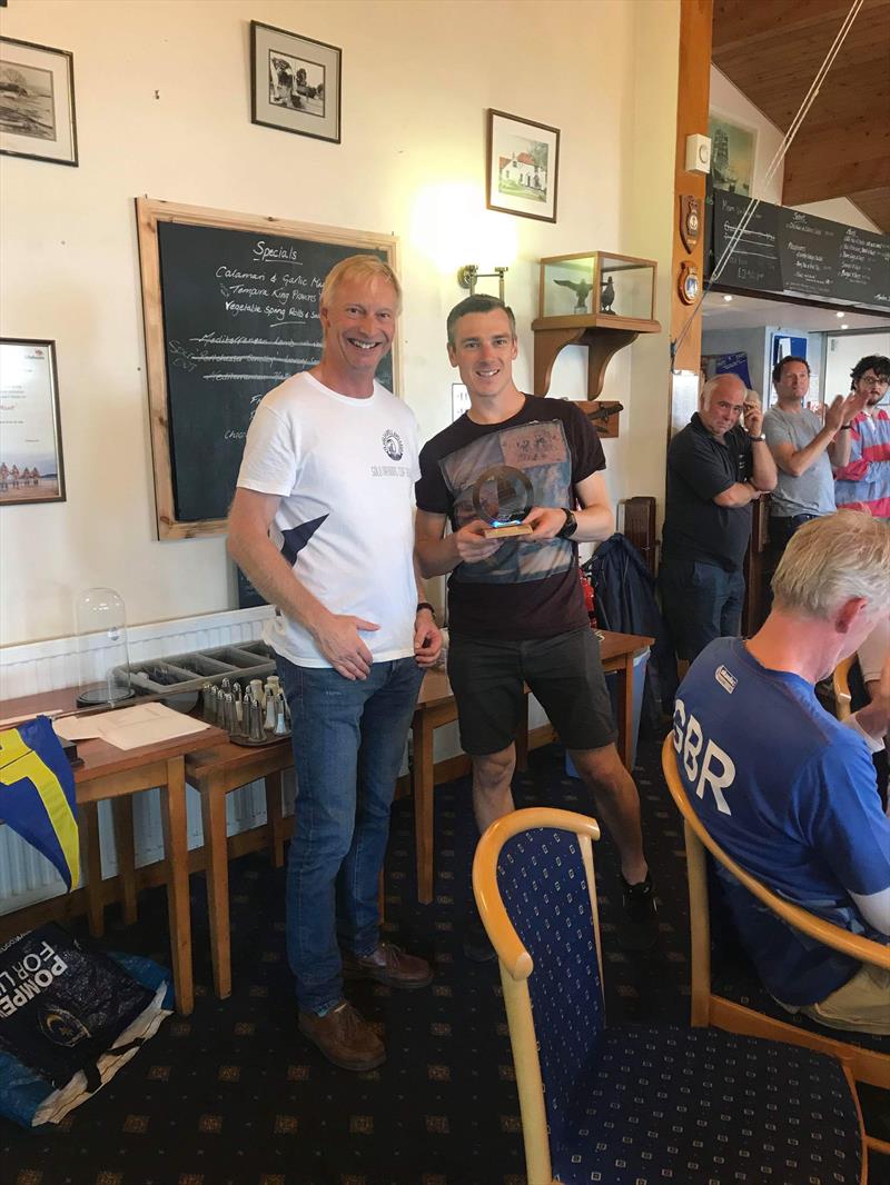 James Boyce, winner at the Portchester Solo Open, with President Doug Latta photo copyright Alex Butler & Guy Mayger taken at Portchester Sailing Club and featuring the Solo class