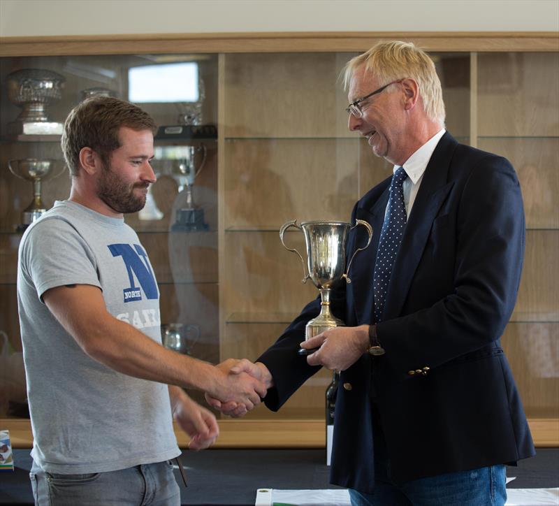 Class President Doug Latta congratulates Harken Solo Inland Championship overall winner Tom Gillard photo copyright Ross Underwood taken at Grafham Water Sailing Club and featuring the Solo class