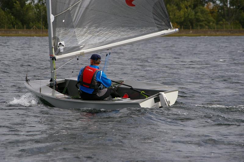 Solos at Island Barn Reservoir photo copyright Jim Champ taken at Island Barn Reservoir Sailing Club and featuring the Solo class