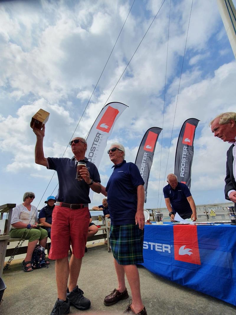 PRO Peter Jelliss receives a gift from the NSCA class President Patrick Burns at the Rooster Solo National Championship photo copyright Will Loy taken at Mount's Bay Sailing Club, England and featuring the Solo class