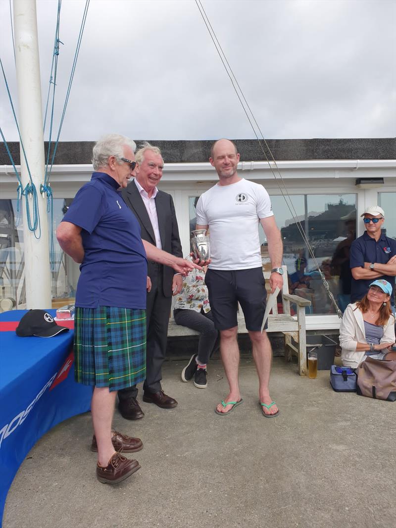 National Champion Andy Davis receives the trophy at the Rooster Solo National Championship photo copyright Will Loy taken at Mount's Bay Sailing Club, England and featuring the Solo class