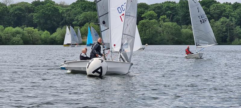 Form a queue during the Border County Midweek Series at Budworth photo copyright PeteChambers / @boodogphotography taken at Budworth Sailing Club and featuring the Solo class