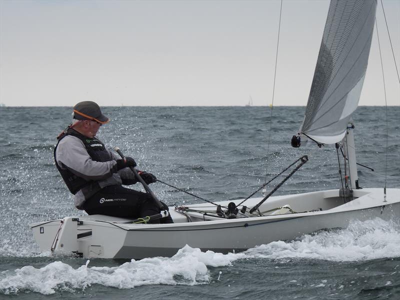 Greg Swift blasts out to the start area at the Solo Nation's Cup in Carnac photo copyright Will Loy taken at Yacht Club de Carnac and featuring the Solo class