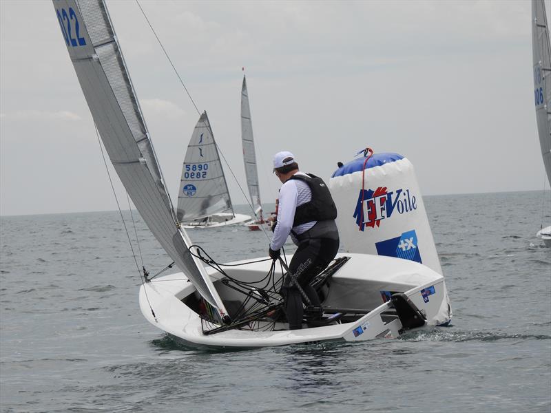 Chris Brown rounds the gate mark at the Solo Nation's Cup in Carnac photo copyright Will Loy taken at Yacht Club de Carnac and featuring the Solo class