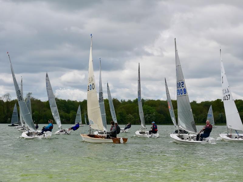 The fleet heading upwind in race 1 during the South Staffs Solo Open photo copyright Chloe Dawson taken at South Staffordshire Sailing Club and featuring the Solo class