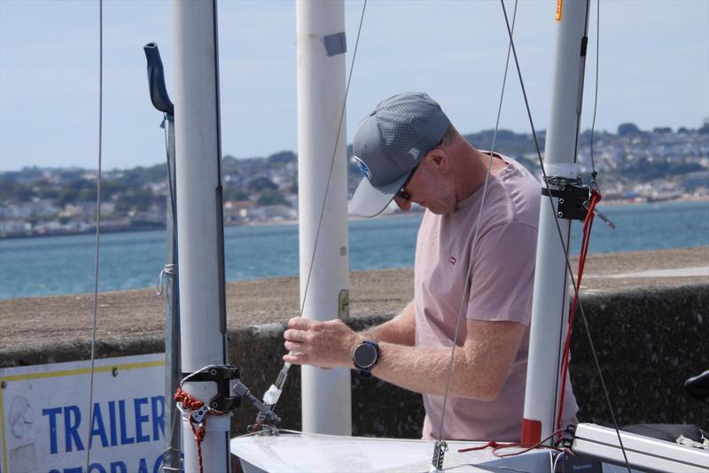 Last minute prep for Charlie Cumbley - P&B Solo National Championship at Royal Torbay photo copyright Will Loy taken at Royal Torbay Yacht Club and featuring the Solo class