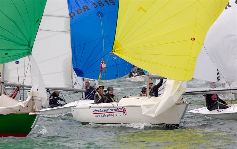 Sonar fleet on Day 7 of Cowes Week 2025 photo copyright Martin Augustus / www.sailingimages.co.uk taken at Cowes Combined Clubs and featuring the Sonar class