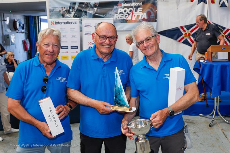 The White Magic team at the International Paint Poole Regatta 2026 Prize Giving photo copyright Paul Wyeth / www.pwpictures.com taken at Royal Motor Yacht Club, England and featuring the Sonata class