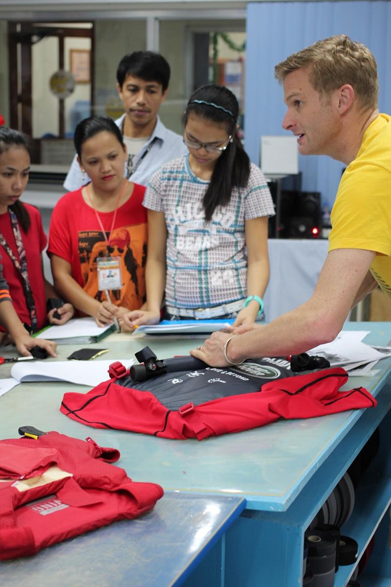 Spinlock's Myles Uren demonstrates the assembly of the T2 lifejacket at the factory photo copyright Spinlock taken at  and featuring the  class