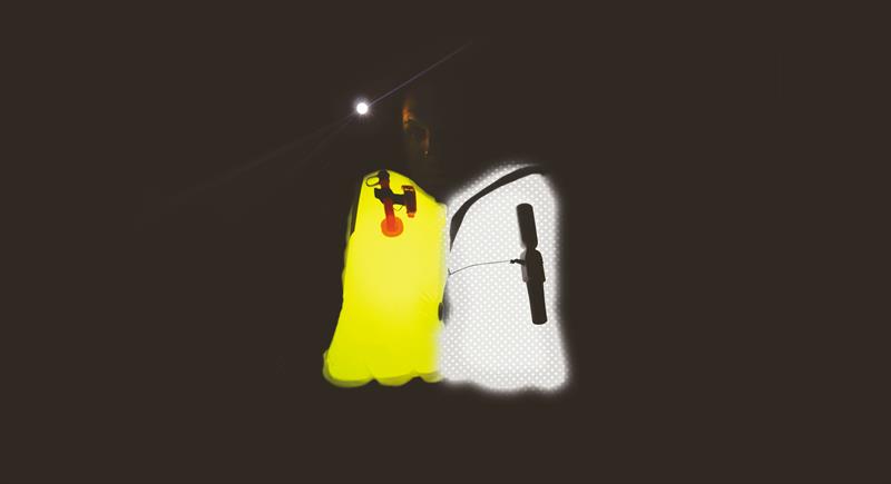 Concept visual showing extra thermoplastic layer containing retro reflective particles versus normal high visibility bladder material - photo © Spinlock