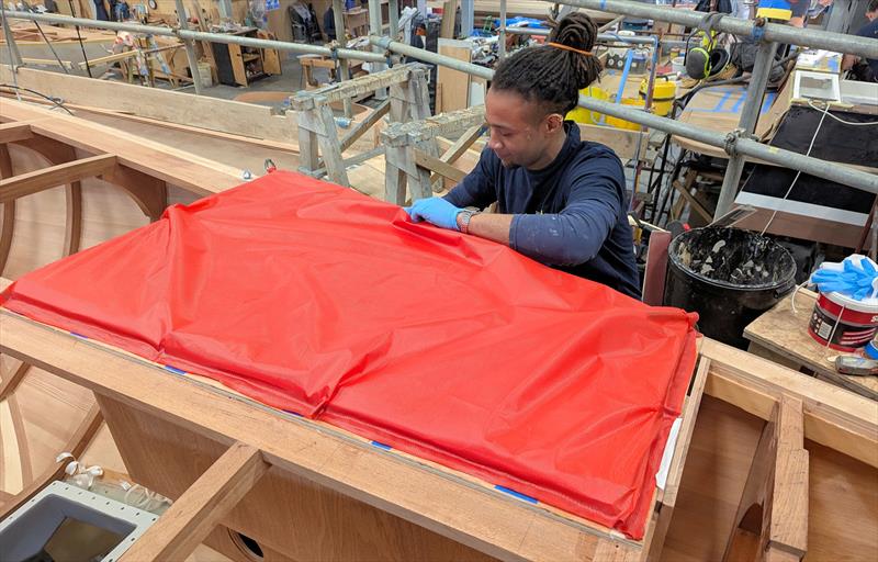 Vacuum bagging on the Q class yacht - photo © Mark Jardine
