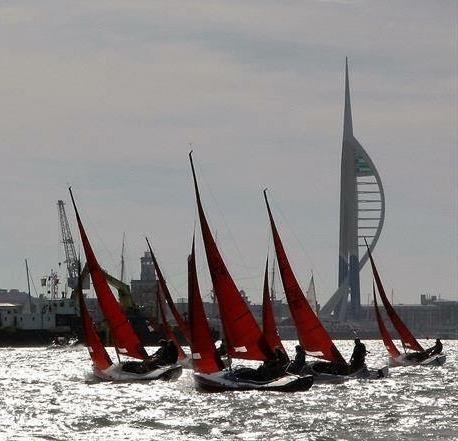 Squibs racing off Portsmouth's Spinnaker Tower photo copyright John Gillard taken at Portsmouth Sailing Club and featuring the Squib class