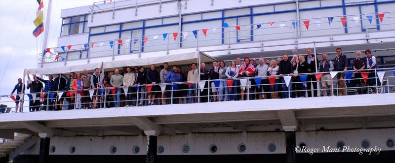 Competitors on the balcony of the Royal Corinthian Yacht Club during the Squib East Coast Championship 2022 - photo © Roger Mant Photography