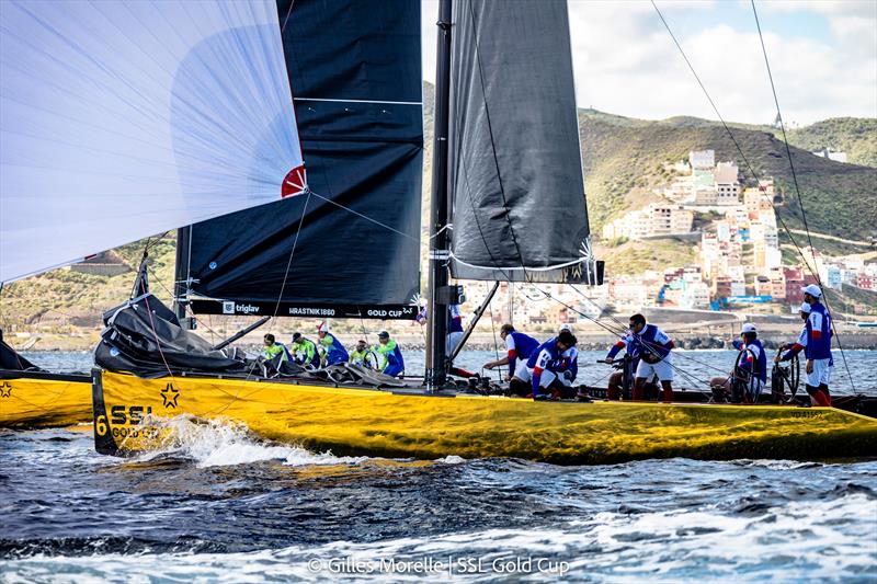 SSL Gold Cup 1/8 Finals Fleet 4, Race 4 - SSL Team France hold SSL Team Slovenia out on the right hand side of the course photo copyright Gilles Morelle / SSL Gold Cup taken at Real Federación Canaria de Vela and featuring the SSL47 class