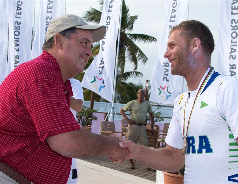 Dennis Conner congratulates Robert Scheidt who won the Star Sailors League Finals photo copyright Carlo Borlenghi / SSL taken at  and featuring the Star class