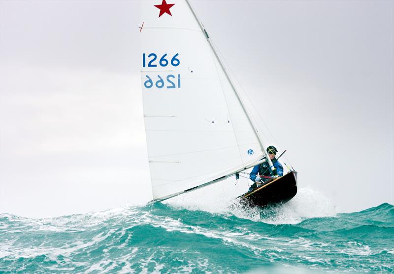 Mike Snow-Hansen at the peak of a six metre swell 2006 Nationals, New Plymouth - Des Townson, A sailing legacy  photo copyright Taranaki Daily Times taken at  and featuring the Starling class