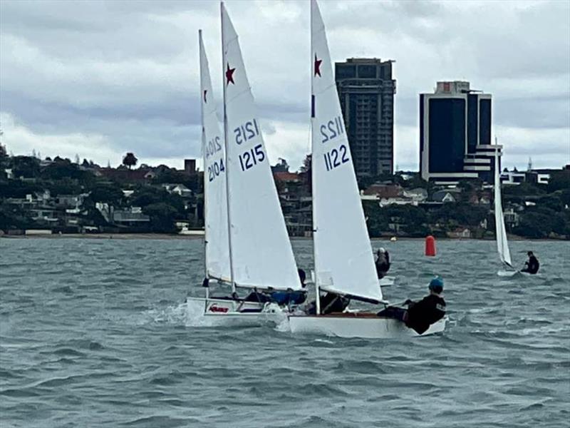 Winner Tom Pilkington (1122) covers runner-up Miro Luxford (1215) with 6th overall Rory Sims (2104) competing in the Auckland Starling Championships, Wakatere BC - February 2022 photo copyright Jane Pilkington taken at Wakatere Boating Club and featuring the Starling class