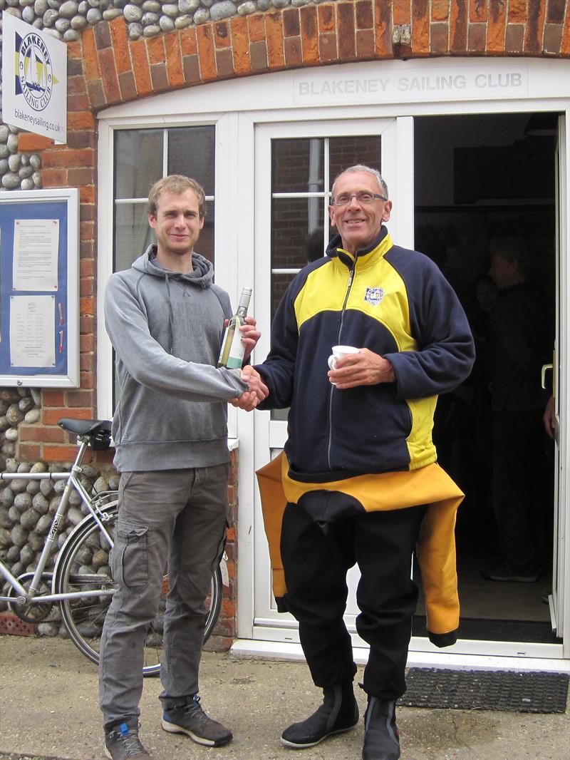 Séan Moore presents the Streaker prize to Doug Horner after the Blakeney Open photo copyright Alan Collett taken at Blakeney Sailing Club and featuring the Streaker class