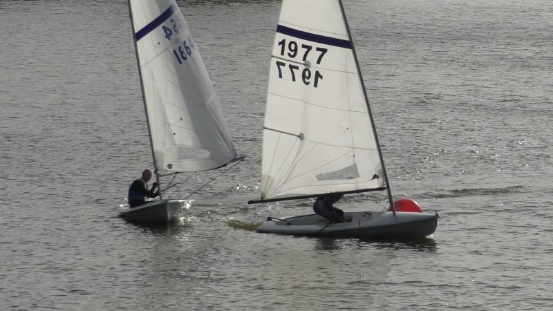 Neil Firth being hunted by Dave Borrett during the Streaker End of Season Championship at Banbury photo copyright Sue Firth taken at Banbury Sailing Club and featuring the Streaker class