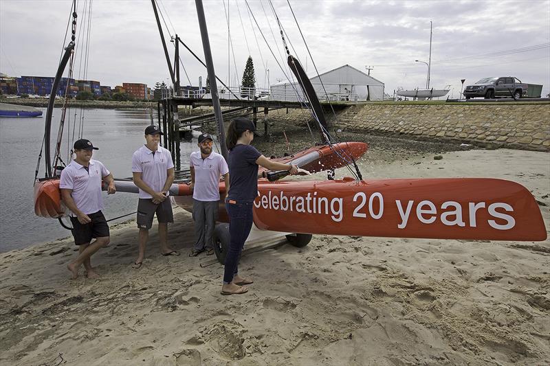 Luke Parkinson, Sam Newton and Ayden Menzies christening the tech2 SuperFoiler - photo © Kerrie Geier