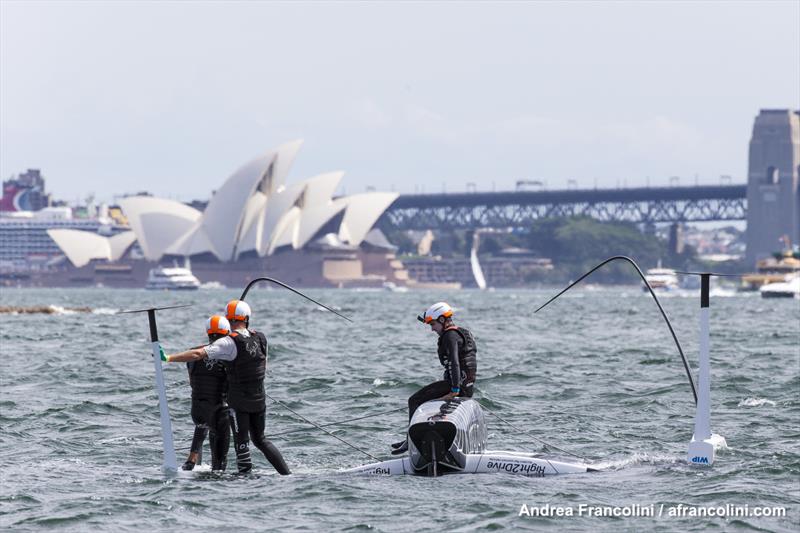 This would be Record Point turned turtle photo copyright Andrea Francolini taken at Woollahra Sailing Club and featuring the Superfoiler class