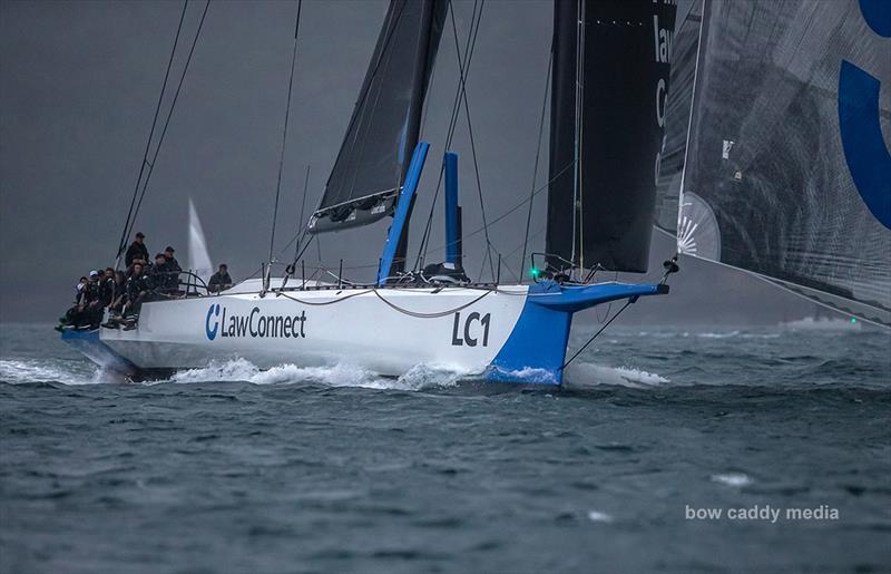 LawConnect leads the fleet to Sydney Heads photo copyright Crosbie Lorimer – Bow Caddy Media taken at Cruising Yacht Club of Australia and featuring the Superyacht class