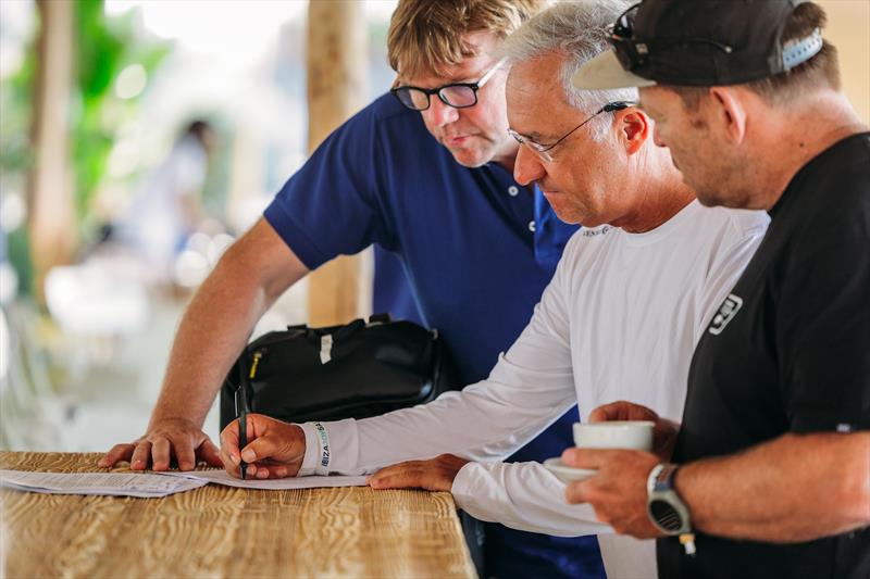 Ibiza JoySail Race Director Nacho Postigo (center) photo copyright Sailing Energy taken at  and featuring the Superyacht class