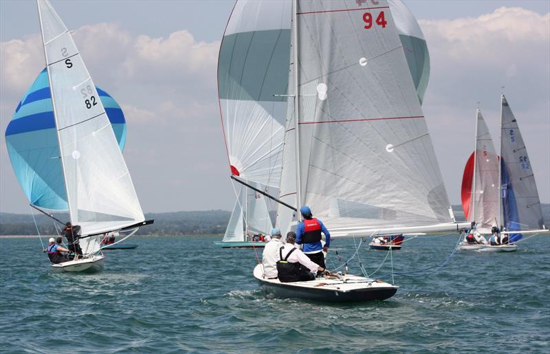 Spinnaker skills to the fore downwind in the Swallow fleet photo copyright Kirsty Bang taken at Itchenor Sailing Club and featuring the Swallow class