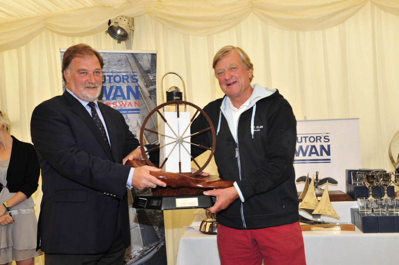 Harald Baum (Elan) receiving the Highland Fling Trophy for the highest placed owner driver at the Swan European Regatta photo copyright Kurt Arrigo / Nautor's Swan taken at Royal Yacht Squadron and featuring the Swan class