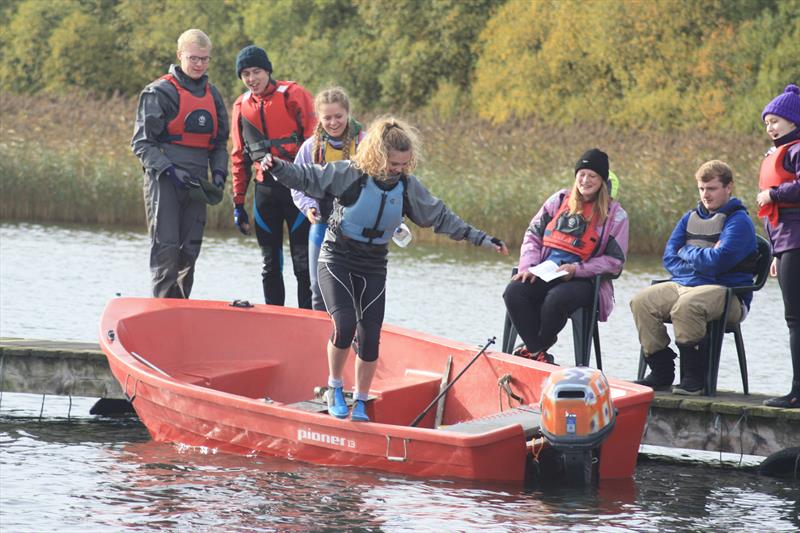 Leeds Fresher's team watch on as Lucy attempts the gunwale walk during the Leeds University Sailing Club Halloween Howler photo copyright James Saul taken at  and featuring the Team Racing class