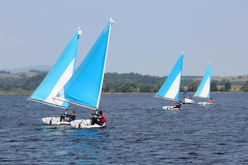 Approaching the finish line (blue flag) and still everything to gain during the 20th Anniversary 5 Castles Inter-Schools Team Racing Regatta photo copyright Lindsay Tosh taken at  and featuring the Team Racing class