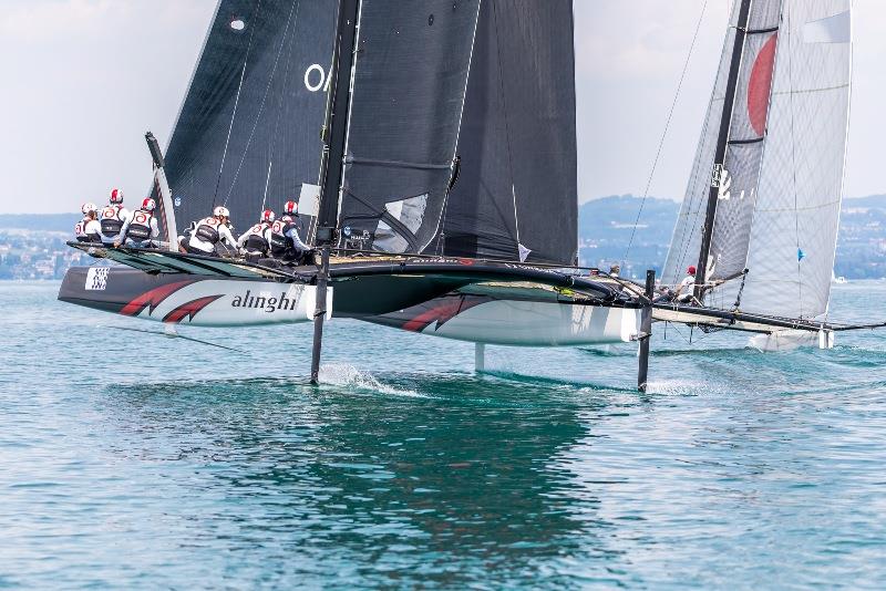 TF35 `foiling` vs M2 `flying` photo copyright Jeanmi Photographies taken at Société Nautique de Genève and featuring the TF35 class