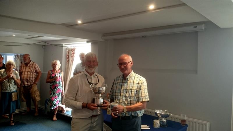 Richard Wilde being presented with the Rose Bowl (fastest single-hander) by Arthur Davey, Chairman of the TOA, at the National Championships photo copyright Chris Hitchings taken at Bosham Sailing Club and featuring the Tideway class