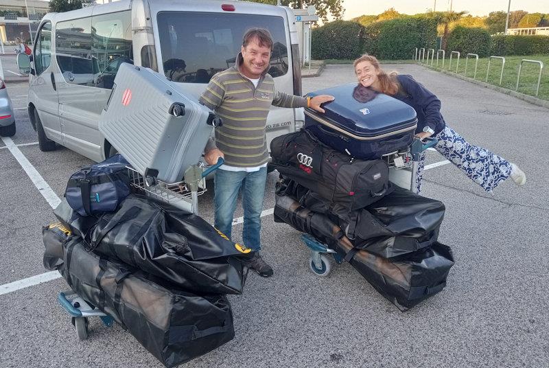 Franco Deganutti, Elisabetta Maffei and their luggage (two inflatable dinghies) boarding at Venice airport for The World's Highest Match Race photo copyright The Grand Tour taken at  and featuring the Tiwal 3R class