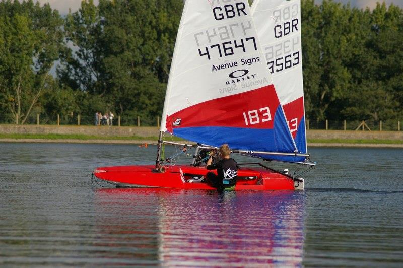 Morgan Archers event winning lee-bow tack in race 4 during the Island Barn Topper Open photo copyright Jim Champ taken at Island Barn Reservoir Sailing Club and featuring the Topper class