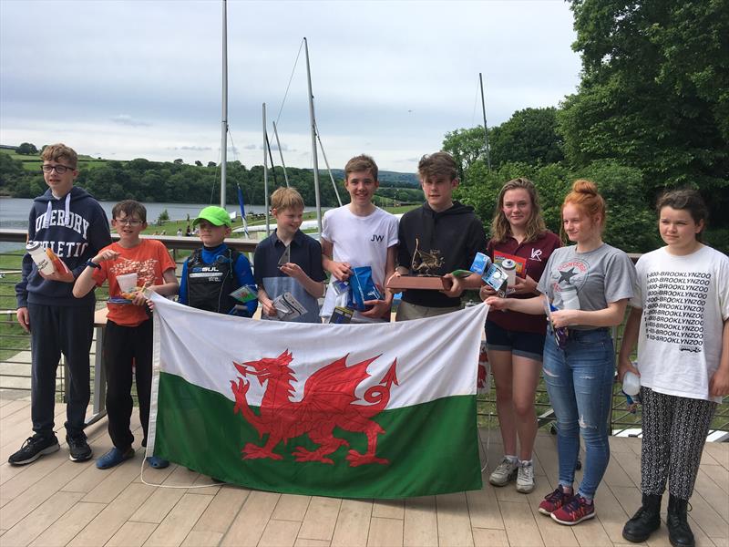 Topper Welsh Championship at Llandegfedd (4th from right Championship winner Ben Willett, with Angus Kemp in second to the left and third place Coco Barrett to the right) photo copyright Juliet Kemp taken at Llandegfedd Sailing Club and featuring the Topper class