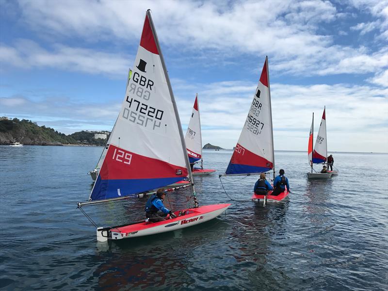 Waiting for the wind at the RTYC Junior Regatta photo copyright Nicholas James taken at Royal Torbay Yacht Club and featuring the Topper class