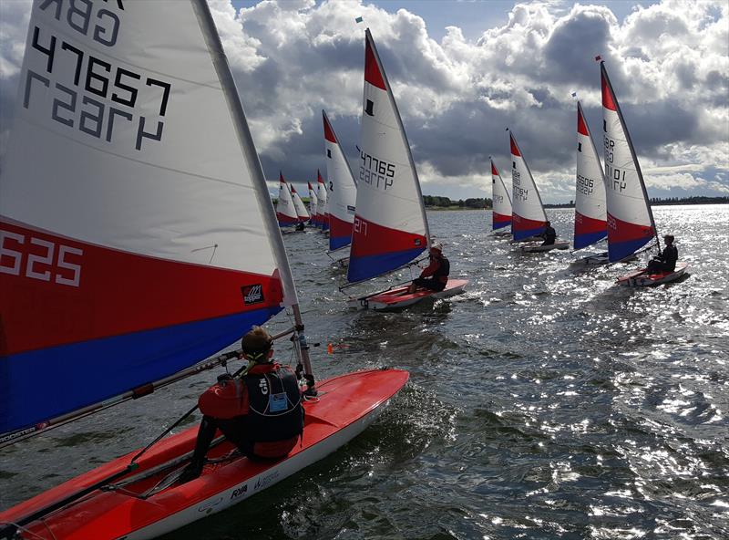 Charlie Turnbull, Kamran Ewbank, Annabell Turnbull & Jude Singleton lead the fleet away in the final race during the Topper Midlands Traveller Draycote photo copyright Midlands Topper Fleet taken at Draycote Water Sailing Club and featuring the Topper class