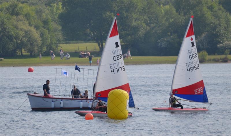 A close finish in race 3 during the Midlands Topper Travellers at Chase photo copyright V Turnbull taken at Chase Sailing Club and featuring the Topper class