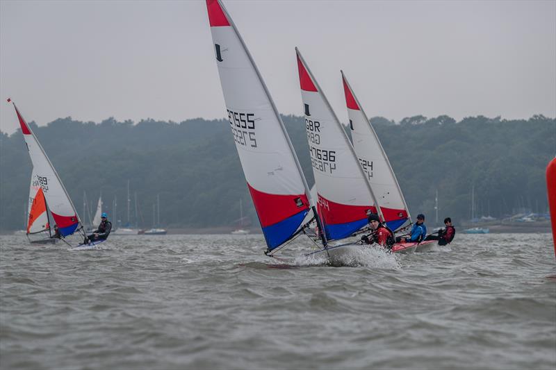 Three of the Chipstead Four, led by Alex Yeates (27555) with Ed Smith and Daniel Hebditch in line astern during the KSSA Mid-Summer Regatta at Medway photo copyright Jon Bentman taken at Medway Yacht Club and featuring the Topper class