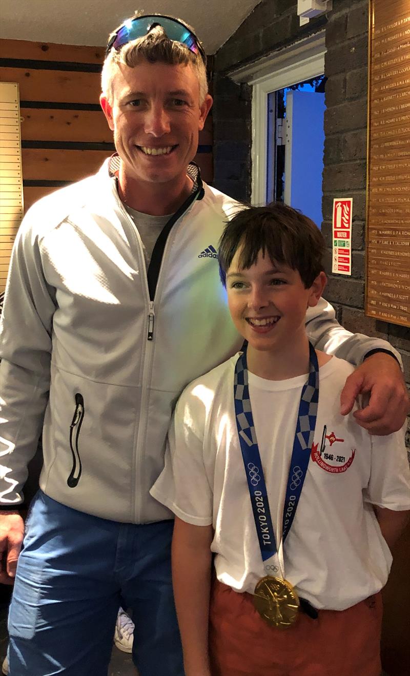 Hollingworth Lake Junior Regatta Week - Race Winner Jasper Bramwell (13) with Olympic Gold Medallist Stuart Bithell photo copyright Rhiann Bramwell taken at Hollingworth Lake Sailing Club and featuring the Topper class