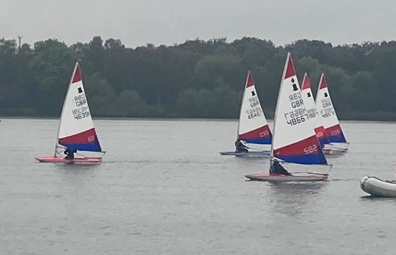 First upwind leg in light winds during Midlands Topper Traveller Round 2 at South Staffs photo copyright Donna Powell taken at South Staffordshire Sailing Club and featuring the Topper class